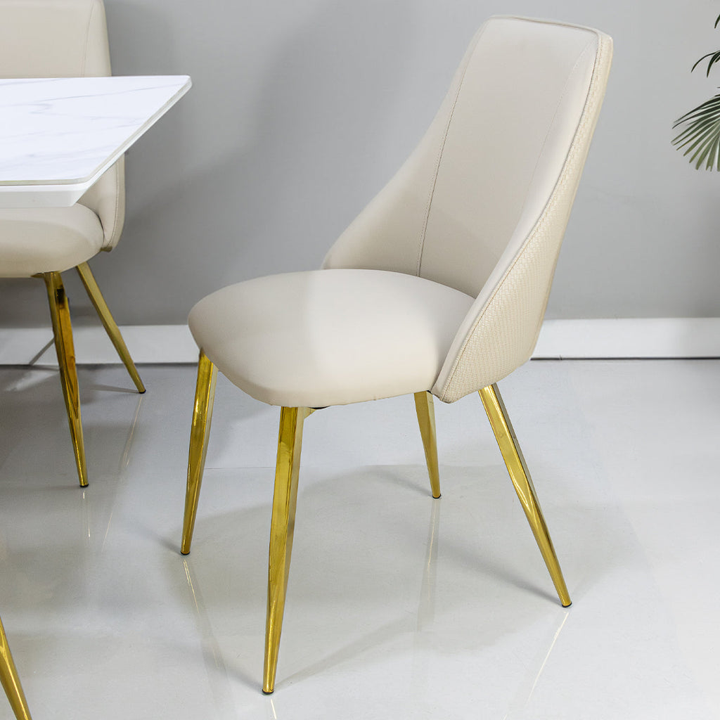 cream chair with gold legs