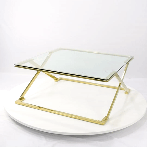 gold coffee table with glass top
