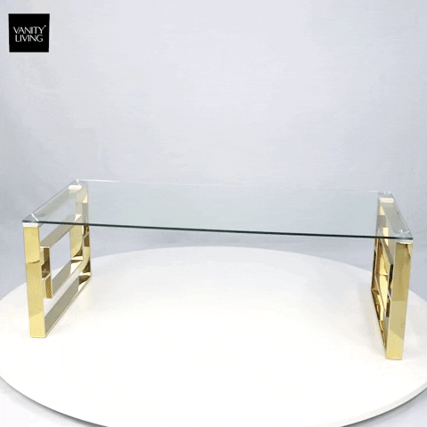 gold coffee table with glass top